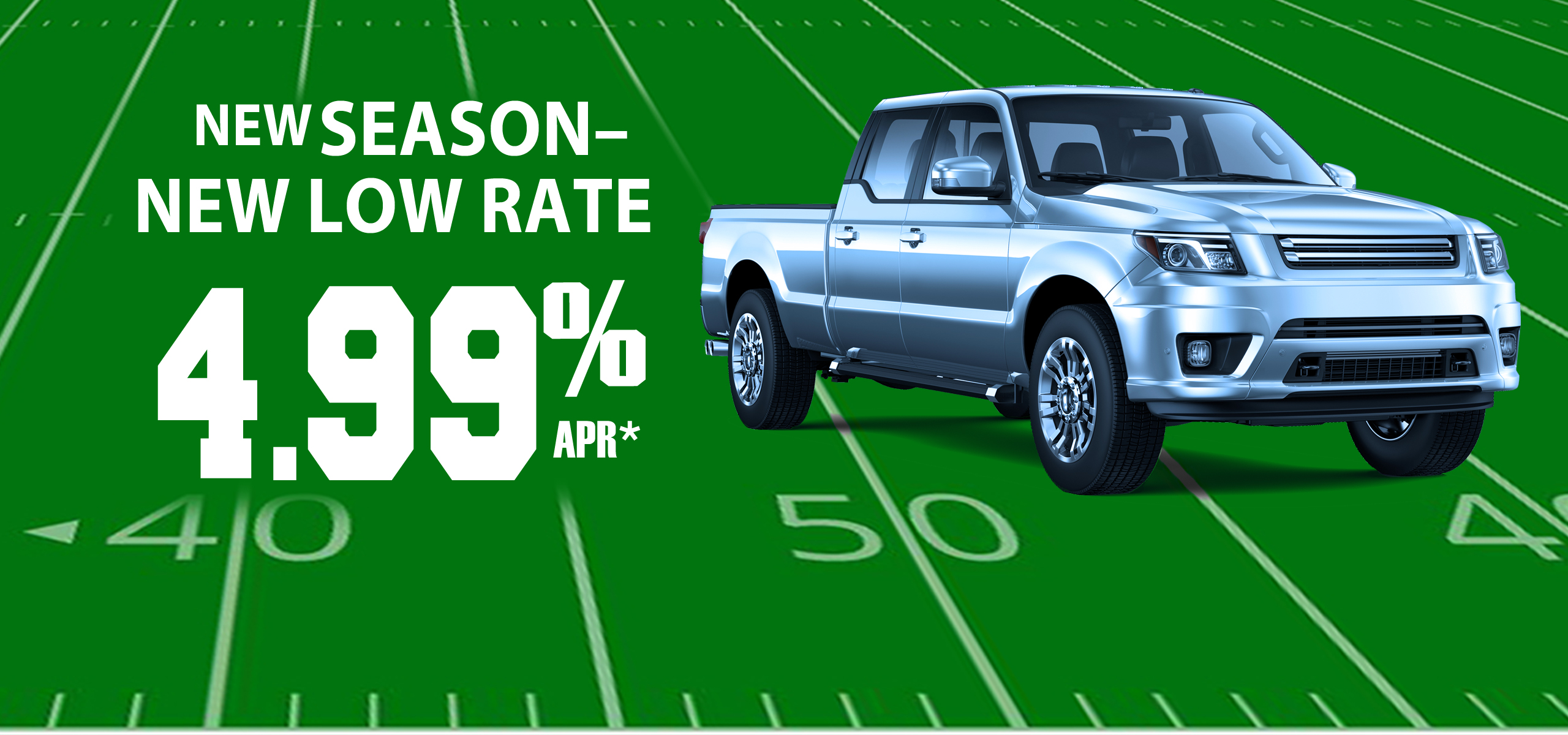 new pickup truck staged on football field. New season, new low rate 4.99% apr*