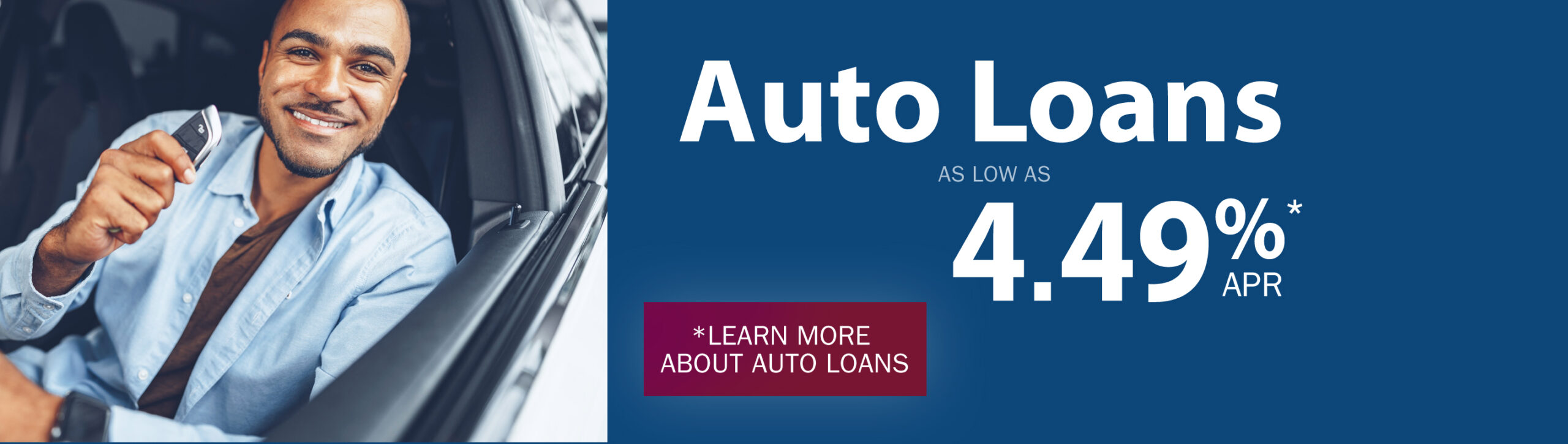 man shows fob to new car. Auto loans as low as 4.49% APR*