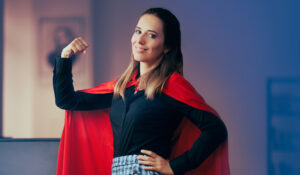 woman with superhero cape