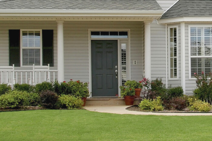 suburban home with welcoming front entry door
