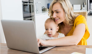 mom online and holding a baby