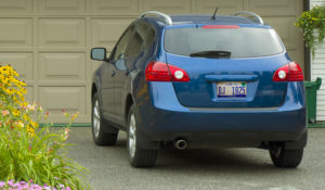 car parked in residential driveway