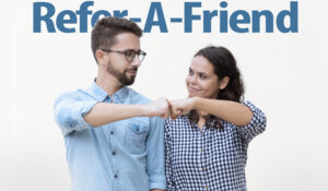 two people fist-bump celebrate