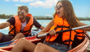 happy people enjoying summer, kayaking