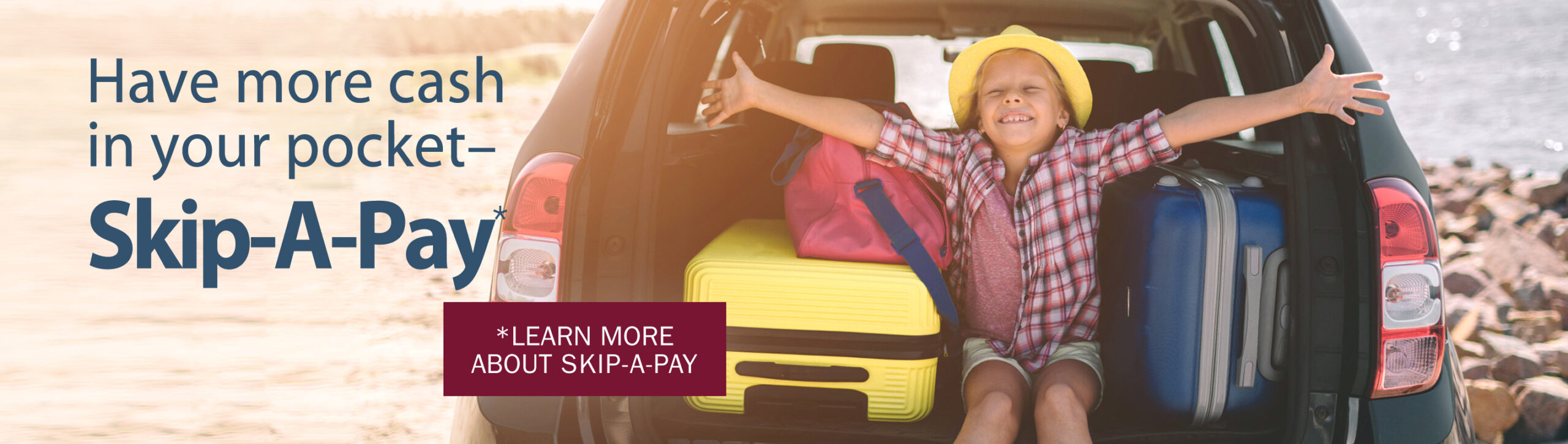 Have more cash in your pocket, Skip A Pay. Learn more about Skip-A-Pay. image of haapy child in car with luggage